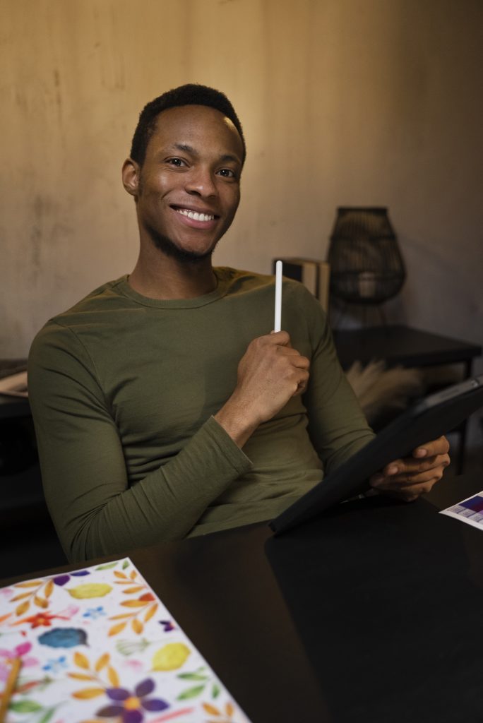 medium shot illustrator drawing tablet